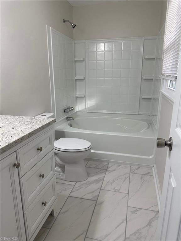 full bathroom featuring vanity,  shower combination, and toilet