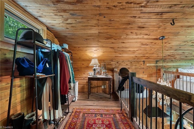 interior space featuring wood walls, wood ceiling, and wood finished floors