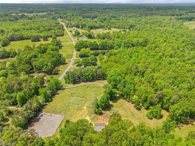 bird's eye view featuring a forest view