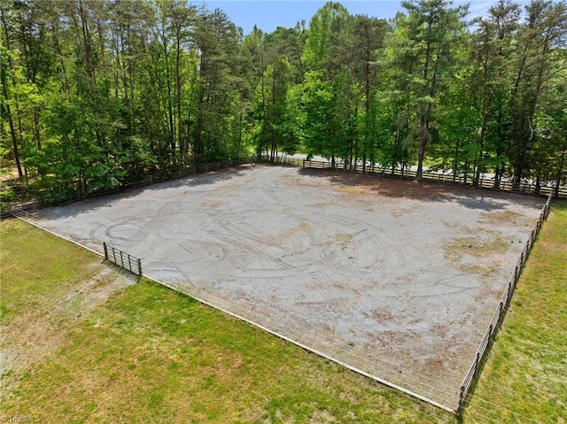 exterior space featuring an enclosed area and fence