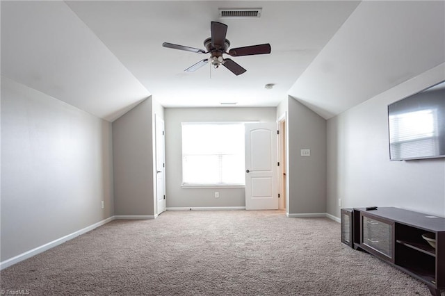 bonus room with vaulted ceiling, ceiling fan, and carpet floors