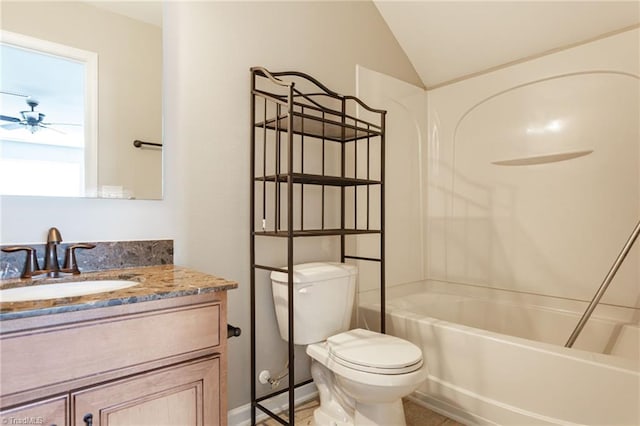 full bathroom featuring ceiling fan, lofted ceiling, toilet, vanity, and shower / tub combination