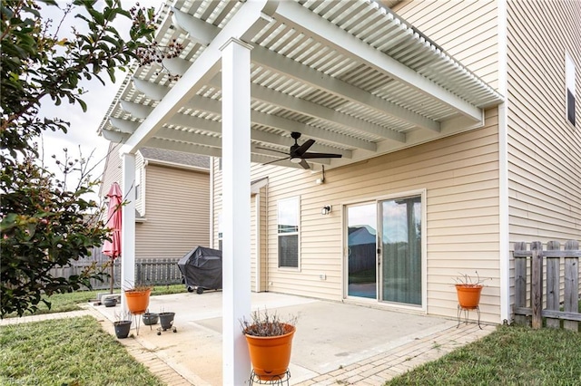 view of patio featuring a pergola, grilling area, and ceiling fan