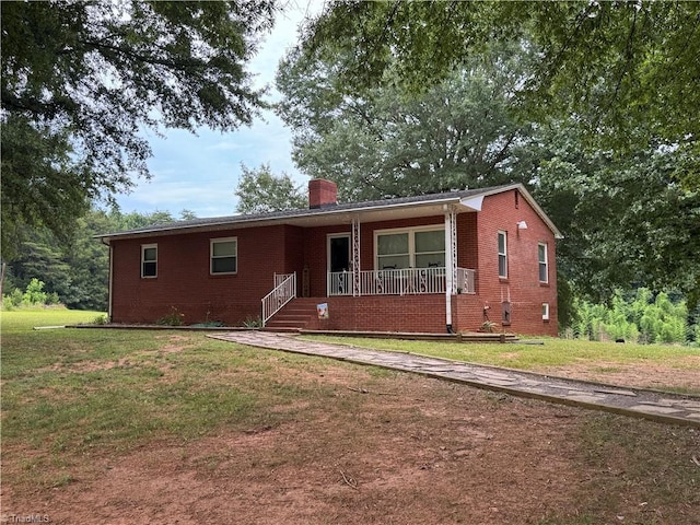 2765 Green Oaks Dr, Winston-Salem, NC 27107 - single story home featuring brick siding, covered porch, and a front lawn