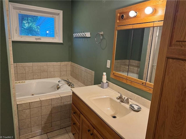 2765 Green Oaks Dr, Winston-Salem, NC 27107 - bathroom featuring a jetted tub, vanity, and tile patterned flooring