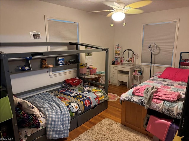 2765 Green Oaks Dr, Winston-Salem, NC 27107 - bedroom with wood finished floors and ceiling fan