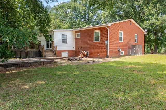 2765 Green Oaks Dr, Winston-Salem, NC 27107 - back of property featuring a lawn, french doors, and brick siding