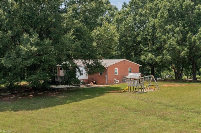 2765 Green Oaks Dr, Winston-Salem, NC 27107 - view of grassy yard with a playground