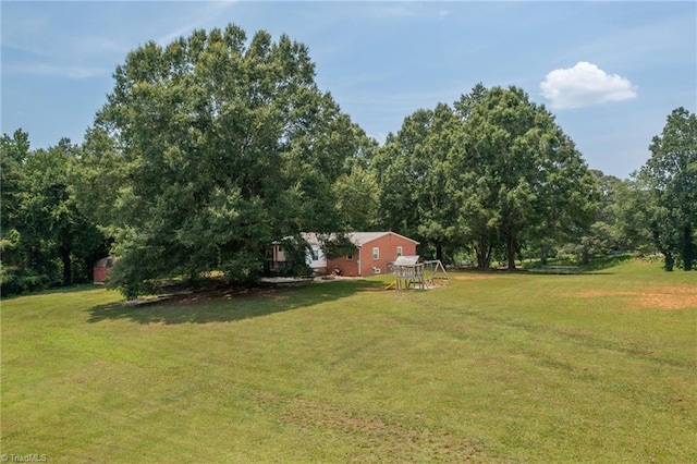 2765 Green Oaks Dr, Winston-Salem, NC 27107 - view of green lawn featuring a playground