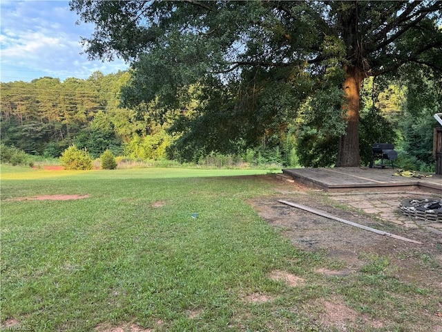 2765 Green Oaks Dr, Winston-Salem, NC 27107 - view of grassy yard with a deck