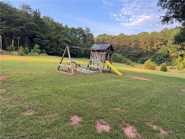 2765 Green Oaks Dr, Winston-Salem, NC 27107 - view of play area with a lawn and a view of trees