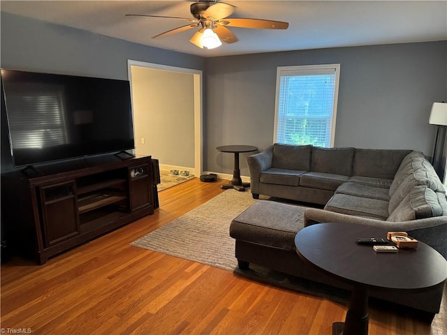 2765 Green Oaks Dr, Winston-Salem, NC 27107 - living area with a ceiling fan and light wood-style floors