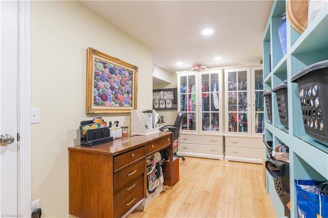 home office with recessed lighting and light wood finished floors