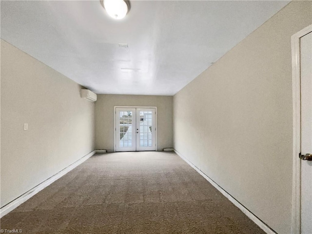 carpeted empty room with french doors and a wall mounted air conditioner