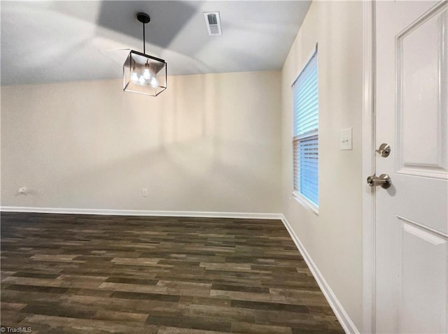 unfurnished dining area with dark hardwood / wood-style flooring