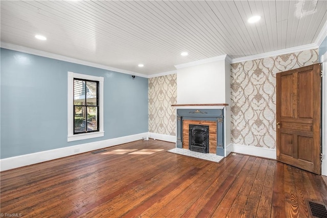 unfurnished living room with a fireplace with flush hearth, baseboards, crown molding, and wallpapered walls