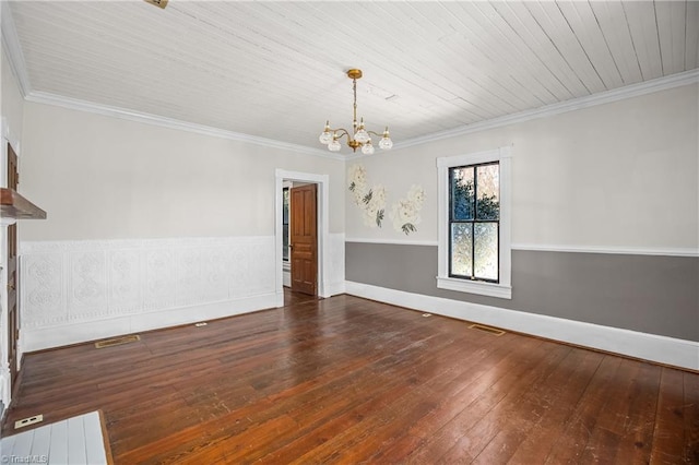 interior space featuring visible vents, an inviting chandelier, hardwood / wood-style floors, and ornamental molding