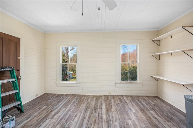 interior space with ceiling fan