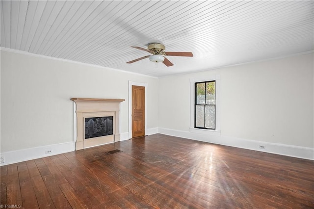 unfurnished living room featuring visible vents, baseboards, ceiling fan, a fireplace, and hardwood / wood-style flooring