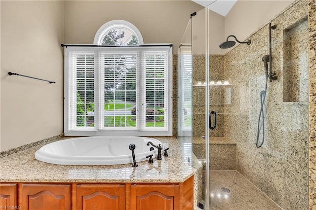 608 Greyrock Rd, Whitsett, NC 27377 - full bathroom featuring a stall shower and a bath