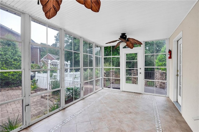 608 Greyrock Rd, Whitsett, NC 27377 - unfurnished sunroom with a ceiling fan