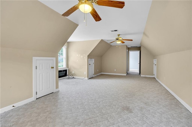 608 Greyrock Rd, Whitsett, NC 27377 - additional living space featuring ceiling fan, carpet flooring, lofted ceiling, and baseboards