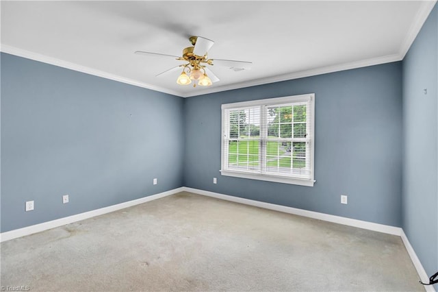 608 Greyrock Rd, Whitsett, NC 27377 - spare room featuring crown molding, baseboards, ceiling fan, and carpet floors