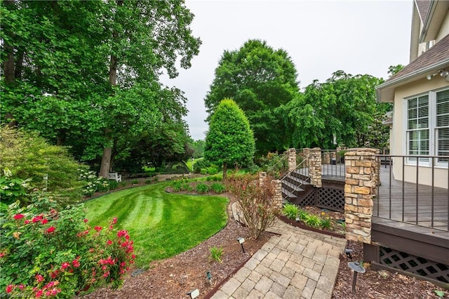 608 Greyrock Rd, Whitsett, NC 27377 - view of green lawn featuring a wooden deck