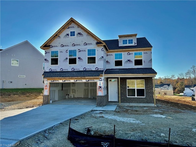 property in mid-construction featuring a garage