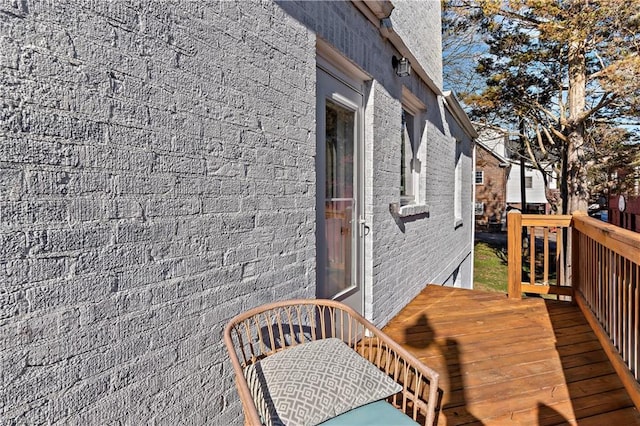 view of home's exterior featuring a wooden deck