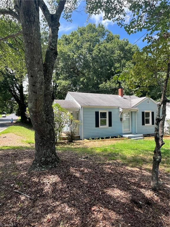 1014 Mccormick St, Greensboro, NC 27403 - view of front of property with a chimney
