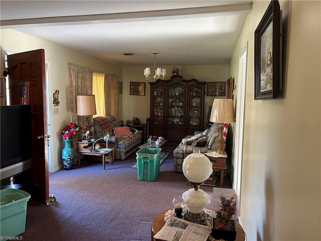 carpeted living room featuring an inviting chandelier