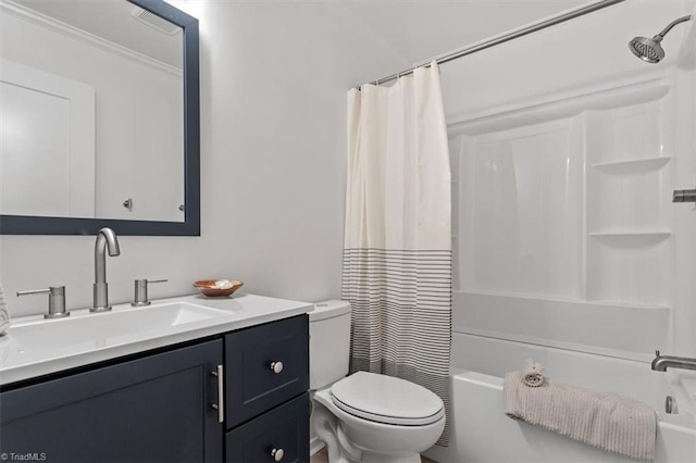 full bathroom with shower / bath combo, vanity, and toilet