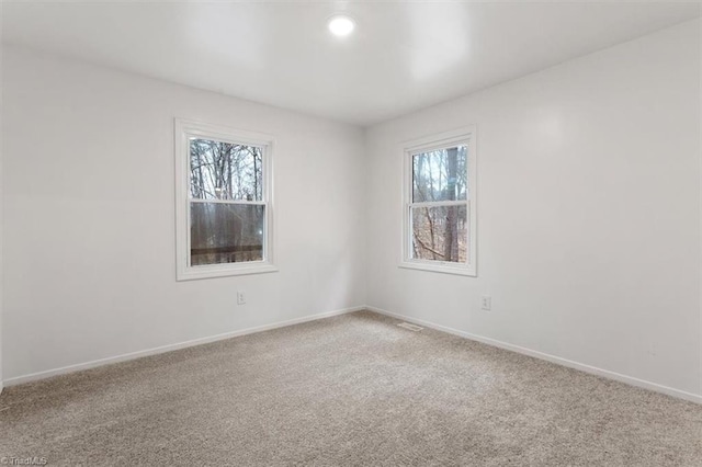 view of carpeted spare room