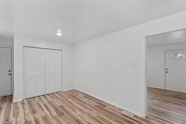 empty room featuring light wood-type flooring