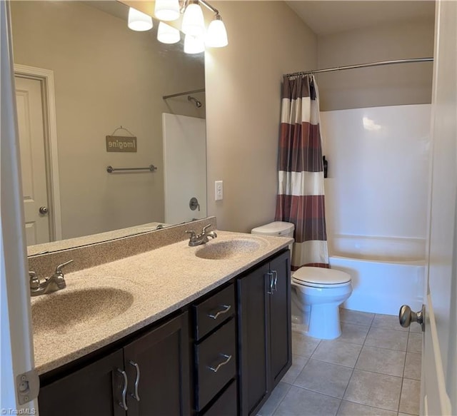 bathroom featuring shower / bath combination with curtain, a sink, toilet, and tile patterned floors