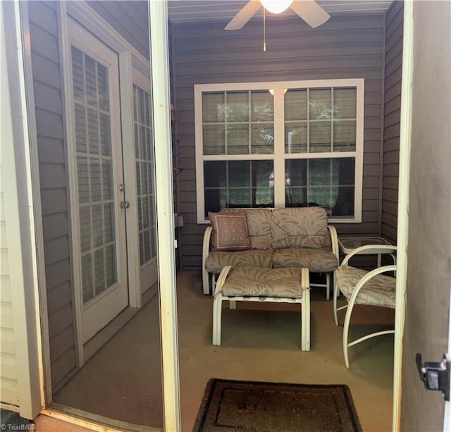 view of patio with french doors and ceiling fan