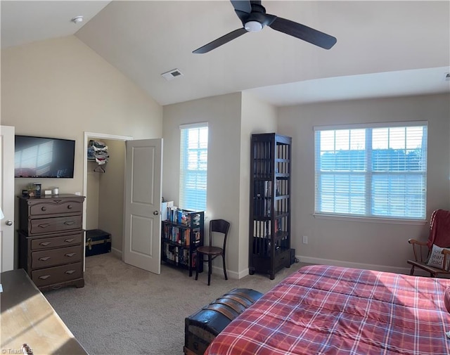 carpeted bedroom featuring ceiling fan, baseboards, visible vents, and vaulted ceiling