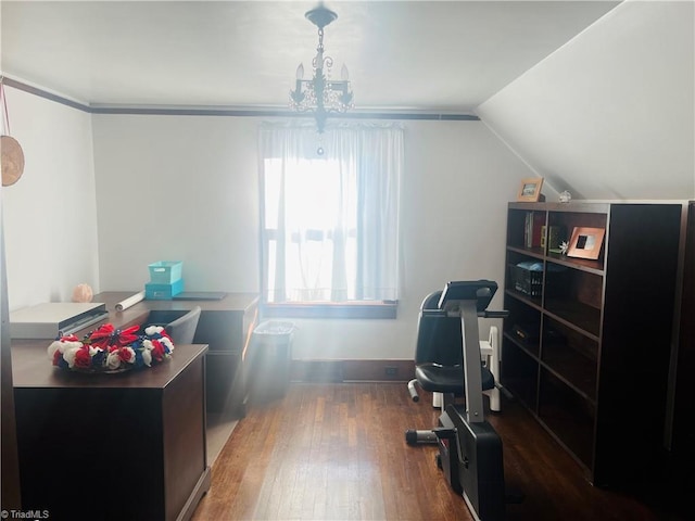 office space featuring lofted ceiling, dark hardwood / wood-style flooring, and a chandelier