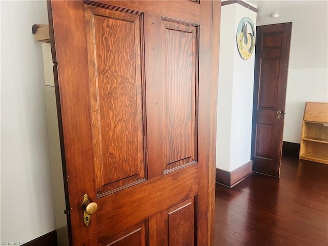 interior details featuring hardwood / wood-style flooring