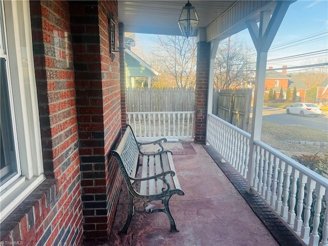 balcony featuring covered porch