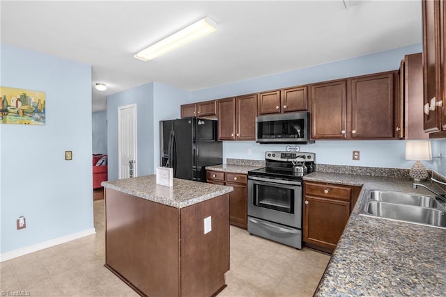 4385 Morning Ridge Ln, Winston-Salem, NC 27101 - kitchen with stainless steel appliances and a center island