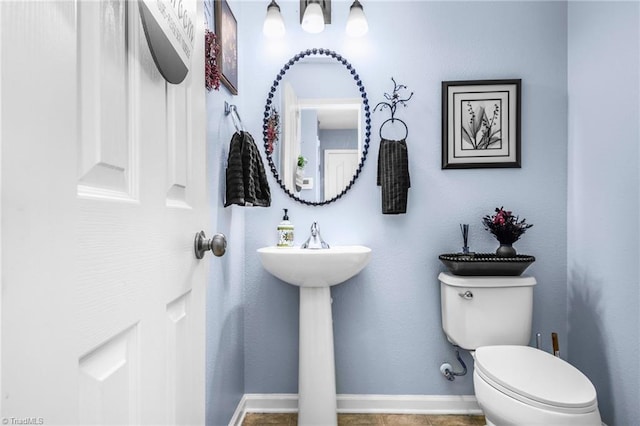 4385 Morning Ridge Ln, Winston-Salem, NC 27101 - bathroom with toilet and baseboards