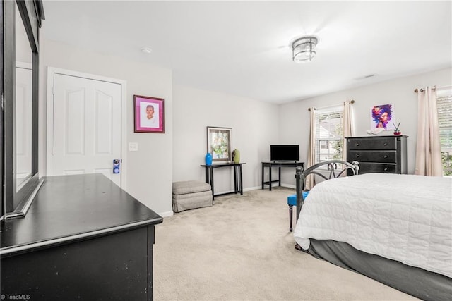 4385 Morning Ridge Ln, Winston-Salem, NC 27101 - bedroom featuring light colored carpet and baseboards