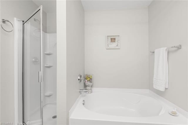 4385 Morning Ridge Ln, Winston-Salem, NC 27101 - bathroom featuring a stall shower and a garden tub
