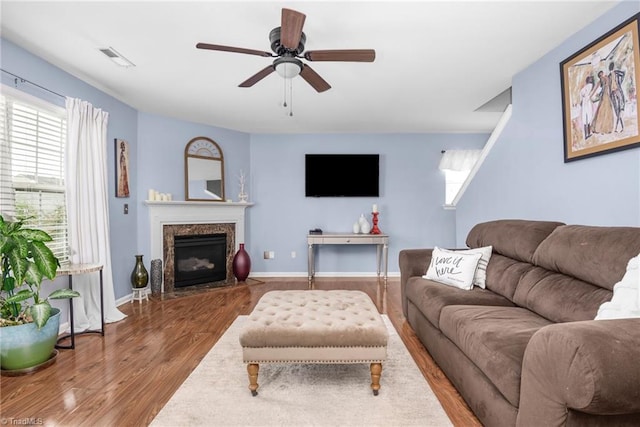 4385 Morning Ridge Ln, Winston-Salem, NC 27101 - living area featuring a ceiling fan, wood finished floors, and a premium fireplace