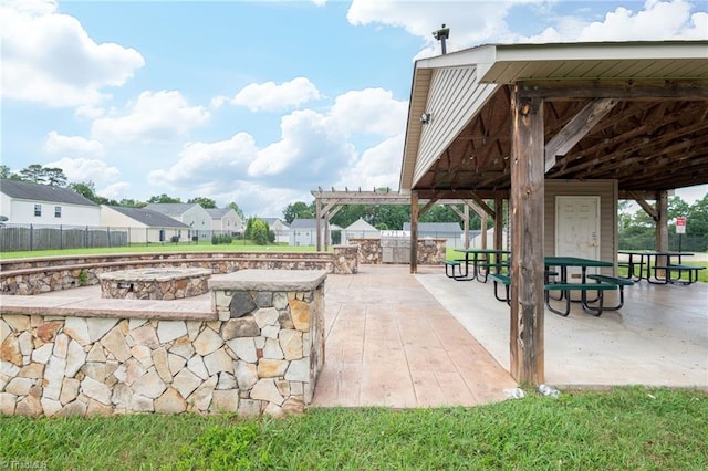 4385 Morning Ridge Ln, Winston-Salem, NC 27101 - view of patio featuring an outdoor fire pit and a residential view