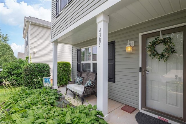 4385 Morning Ridge Ln, Winston-Salem, NC 27101 - view of exterior entry with a porch