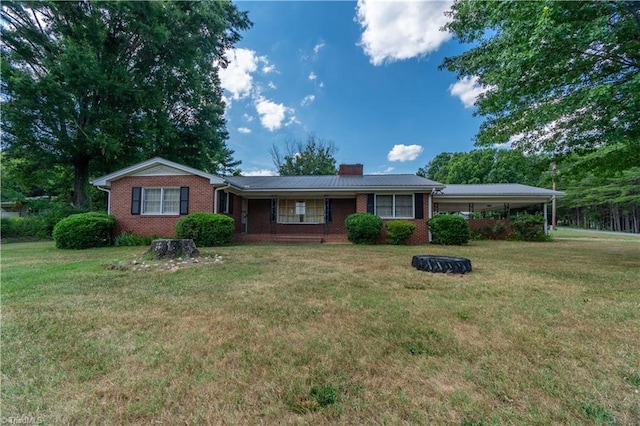 single story home with a front yard and a carport