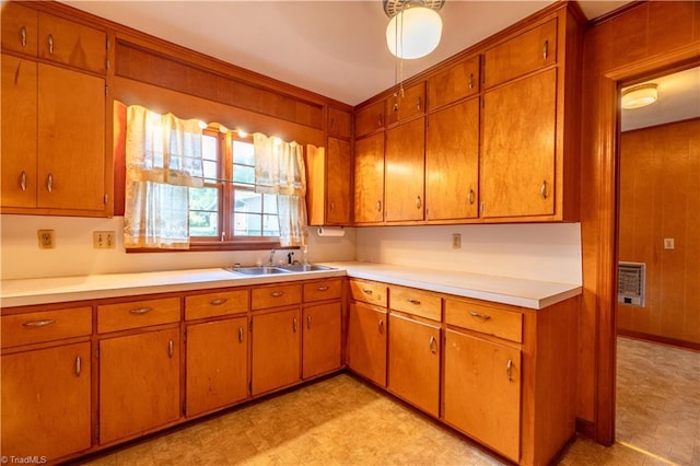 kitchen with heating unit and sink